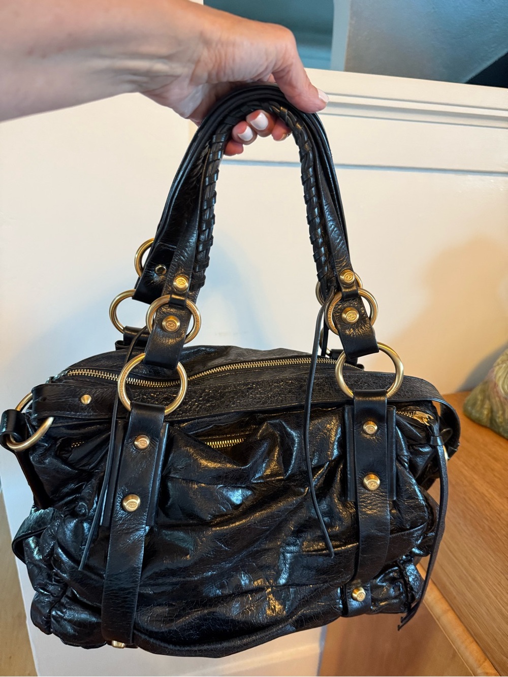Black Leather Handbag, with an edgy vibe.